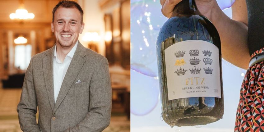 english sparkling wine bottle with man smiling